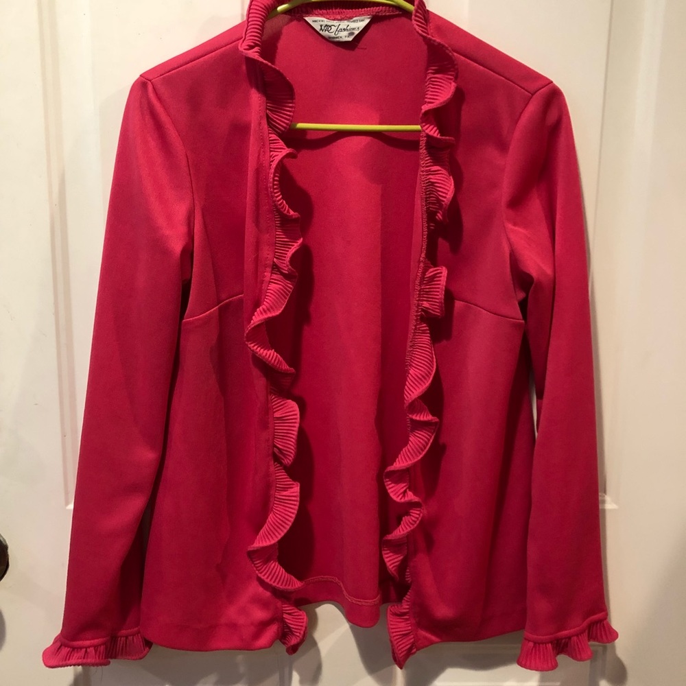 Pink open cardigan with ruffle edges